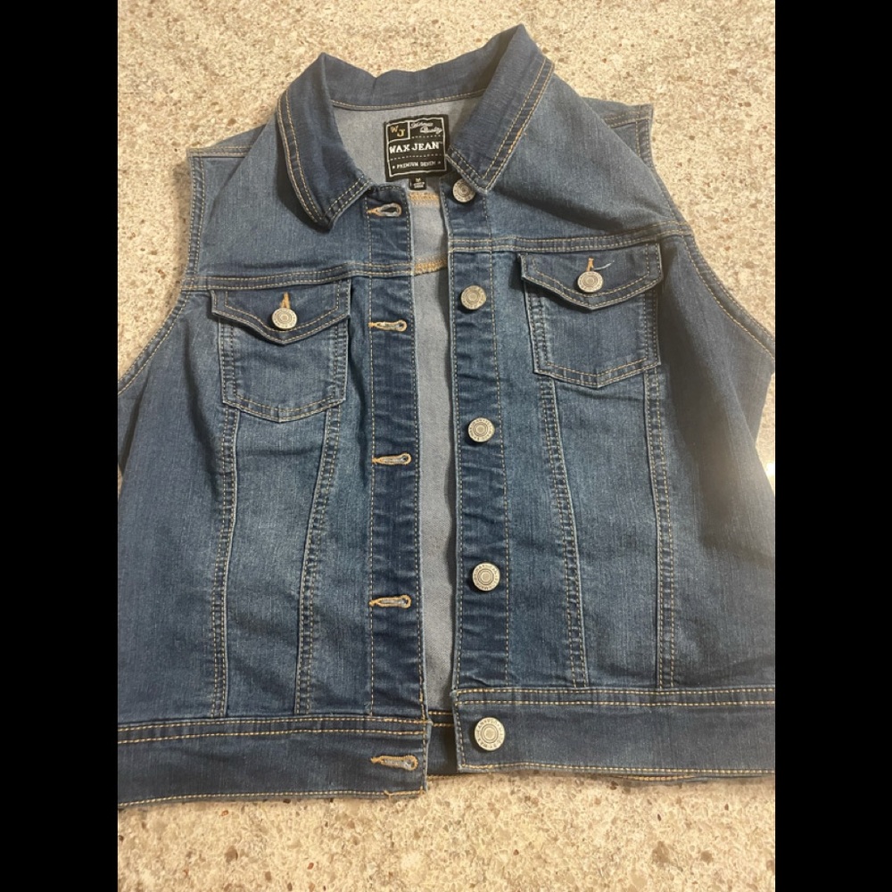 Wax jean sleeveless denim jacket